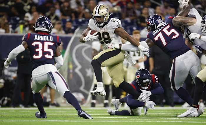 New Orleans Saints running back Devine Ozigbo (28) runs against the Houston Texans. Mandatory Credit: Troy Taormina-USA TODAY Sports